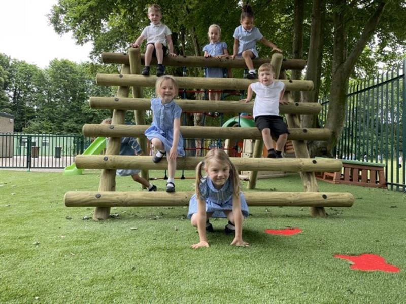 children come down the other end of the log and net climber and land on the surfacing below