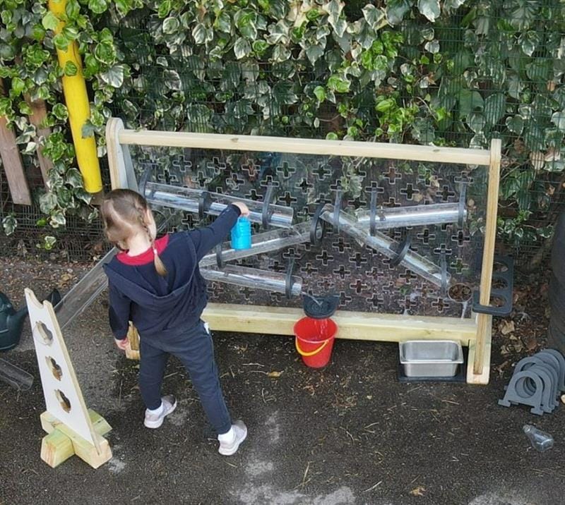 a child plays with the brand new pentagon play water wall