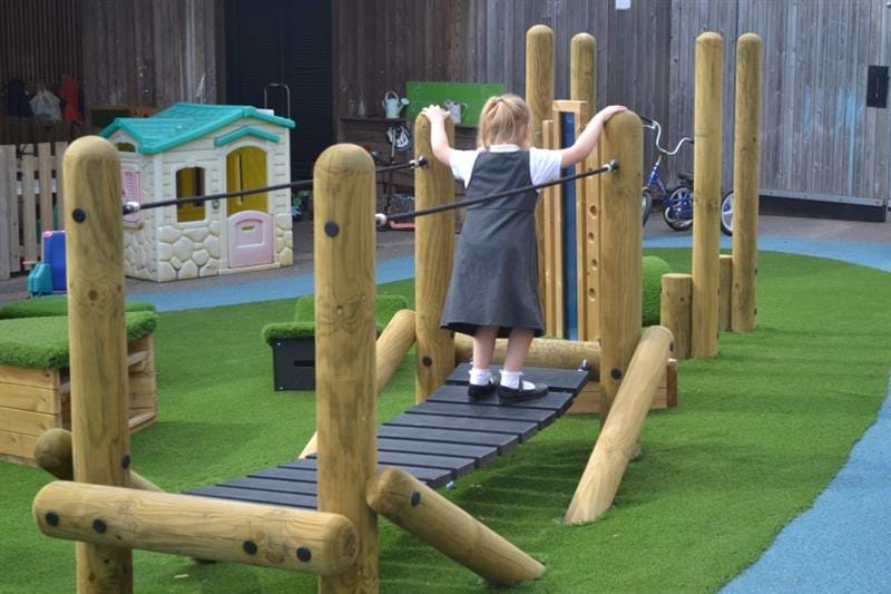 a child crosses the clatter bridge