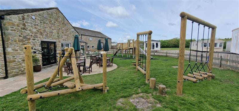 a shot of the empty trim trail at Bowland Fell Holiday Park
