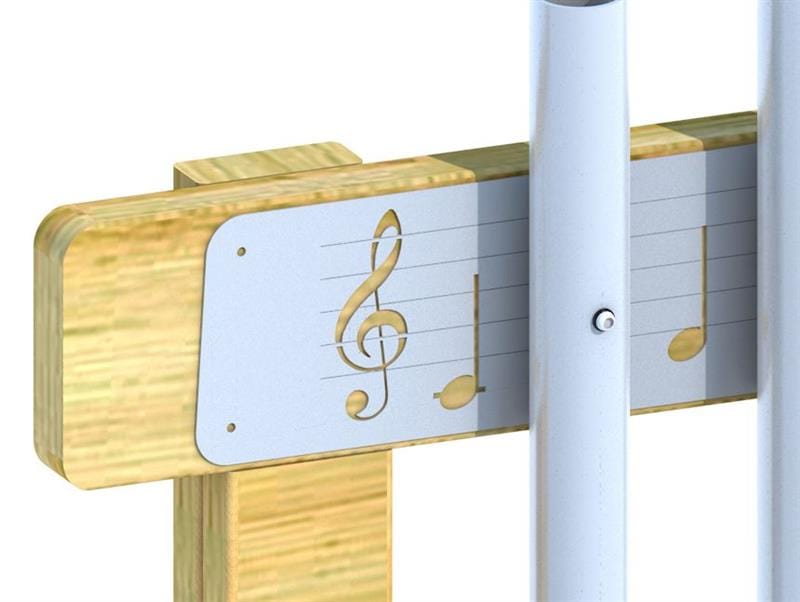 A CGI close up image showing the Wall Mounted Playground Chimes. The image focuses on the engravings, showing the treble cleft note and numerous crotchets engraved on the metal.