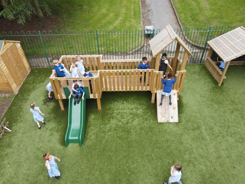 a birdseye view of a timber play tower