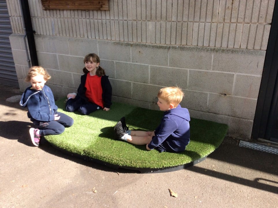 children sit in the stage quadrants and wait for their lesso n plan