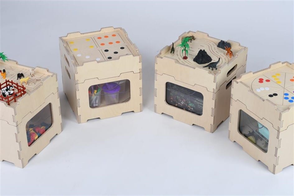 A picture of the stack and sit package 1 on display. This image shows 4 stack and sit blocks lined up whilst storing objects