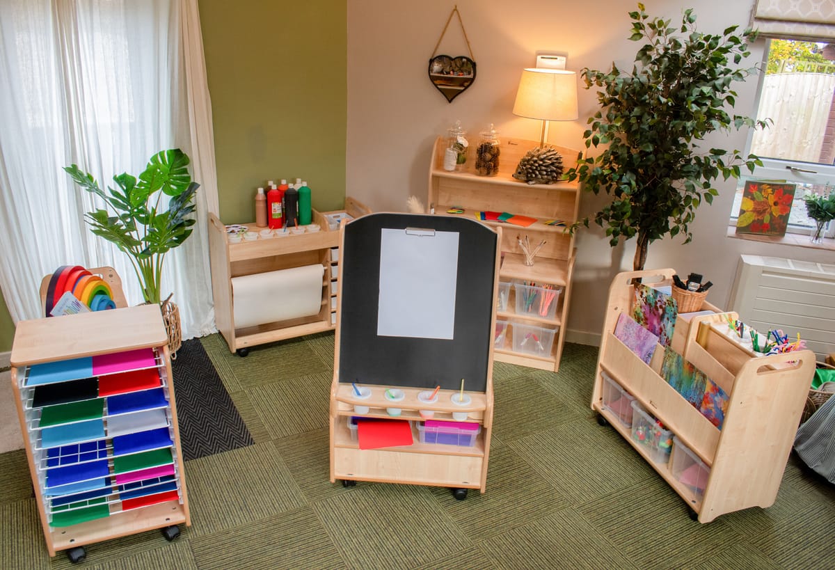 A room full of Millhouse classroom furniture, all of which are designed to help with arts and crafts lessons and constructed from wood.