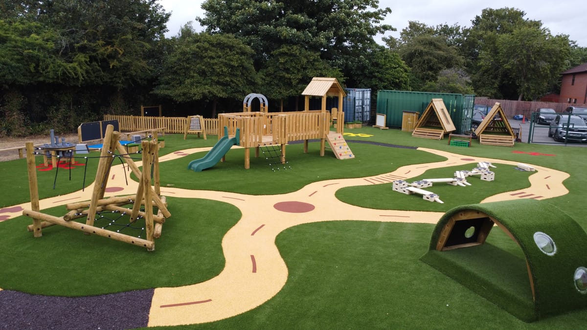 An inclusive playground that was designed by Pentagon Play, featuring a range of play equipment and safety surfacing.