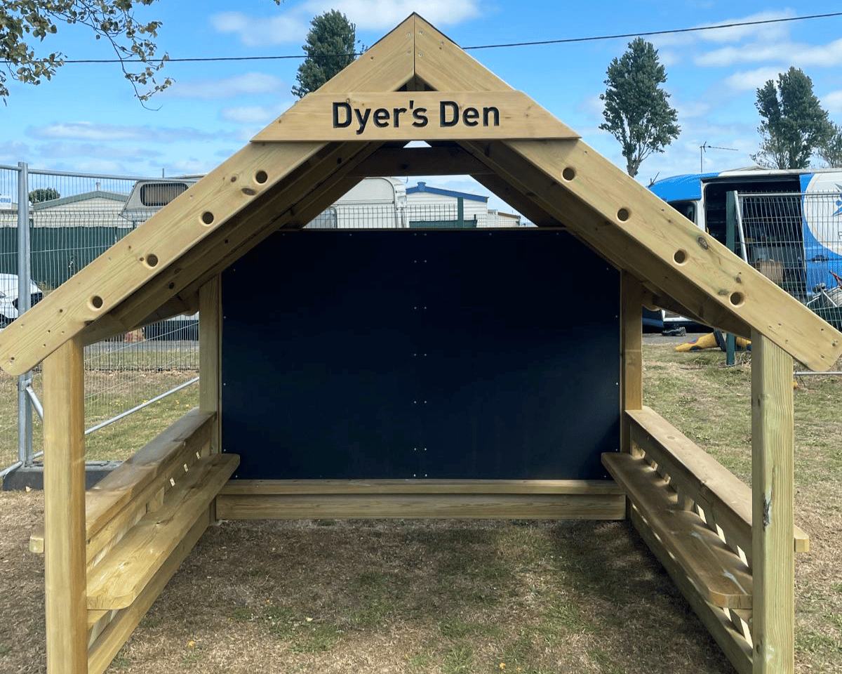 A play den with "Dyers Den" written on top, providing unique branding.