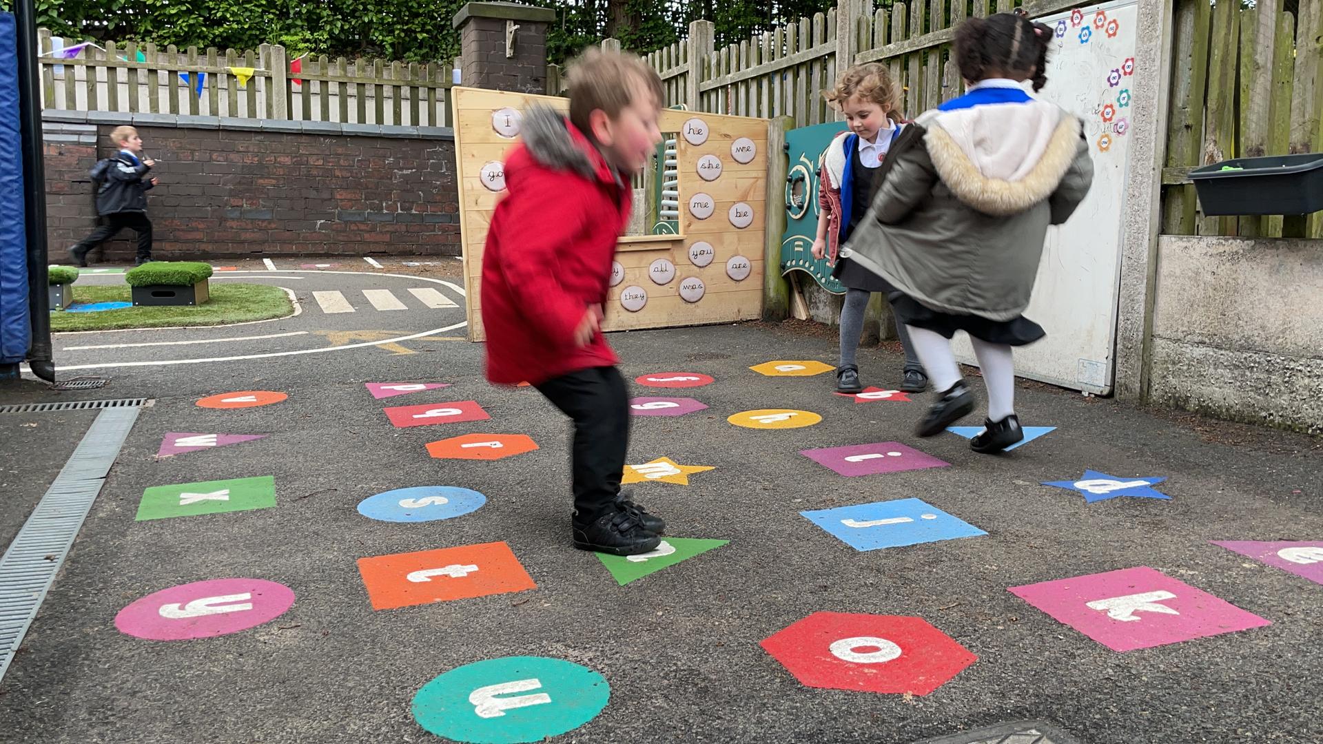 Alpha shape playground markings for schools