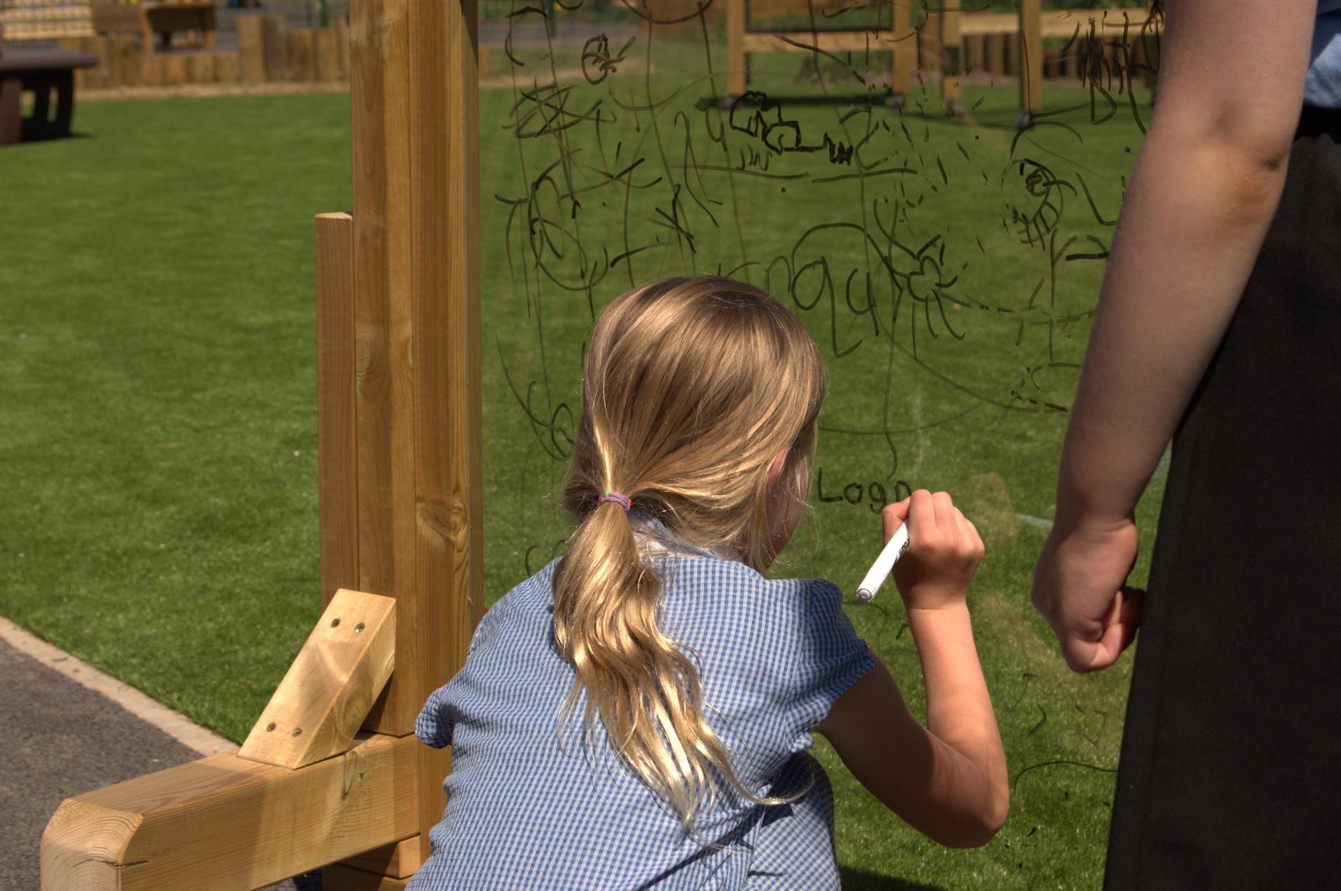 a girl using the paint panels 