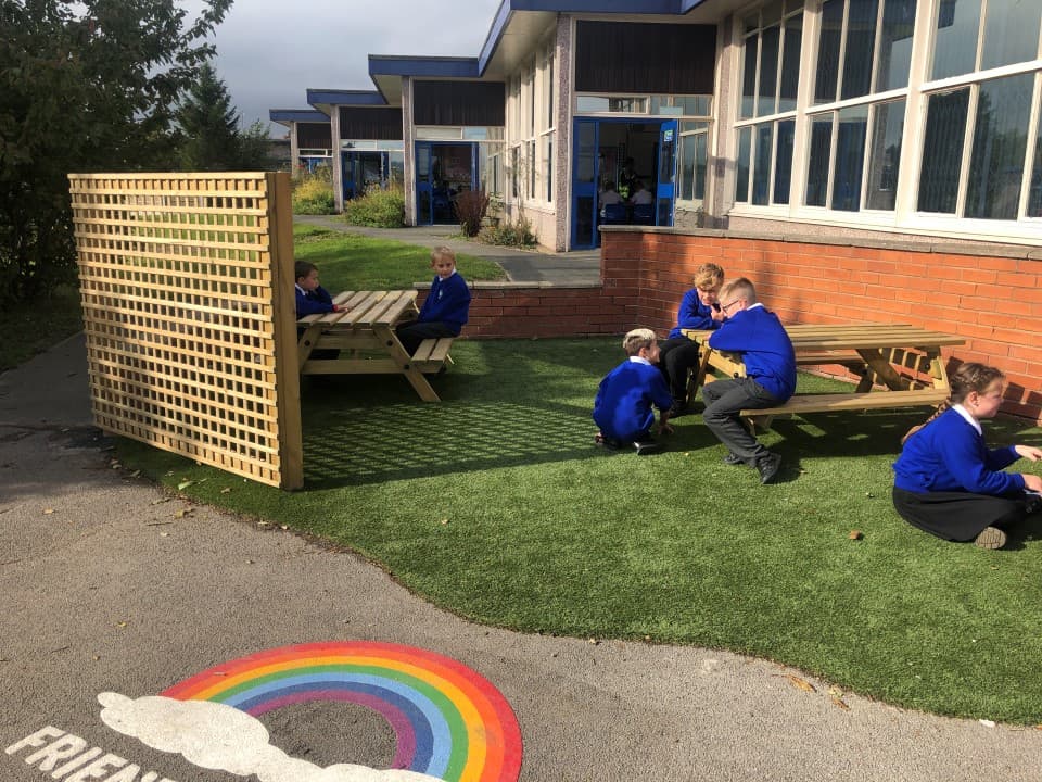the rainbow friendship marking on the school tarmac encouraging friendship