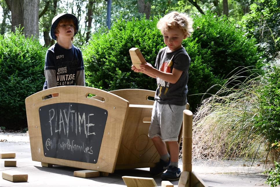 2 young boys playing with the maxi skip