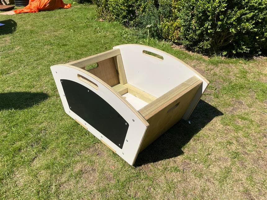 A side view of the mini skip without blocks