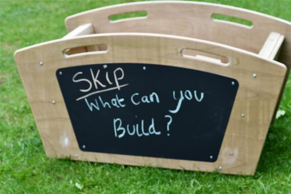 A side view of the Maxi Skip with writing on the side 