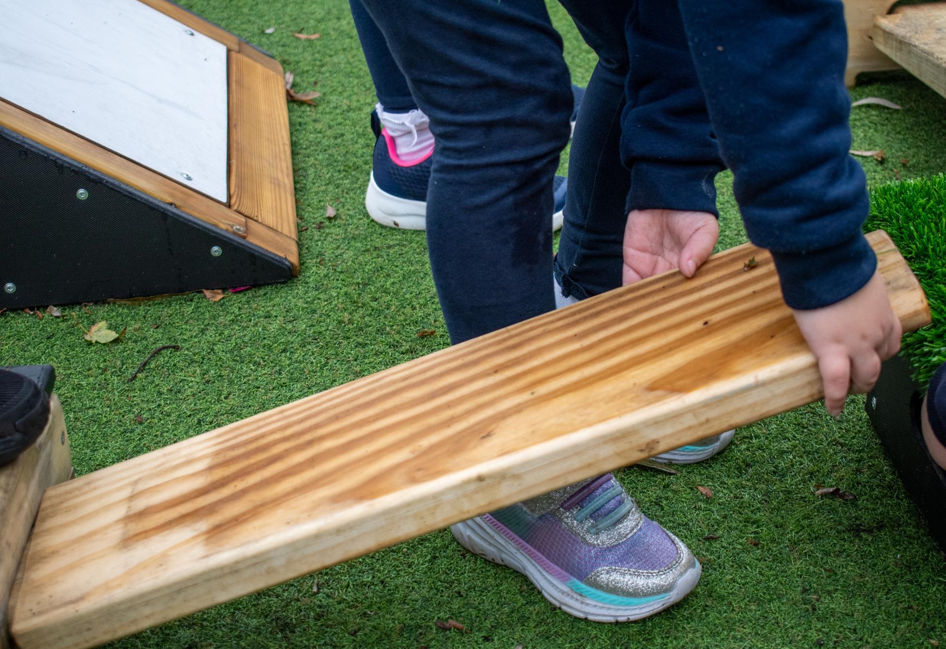 Child with Accoya plank from Sports Premium Explorer Package