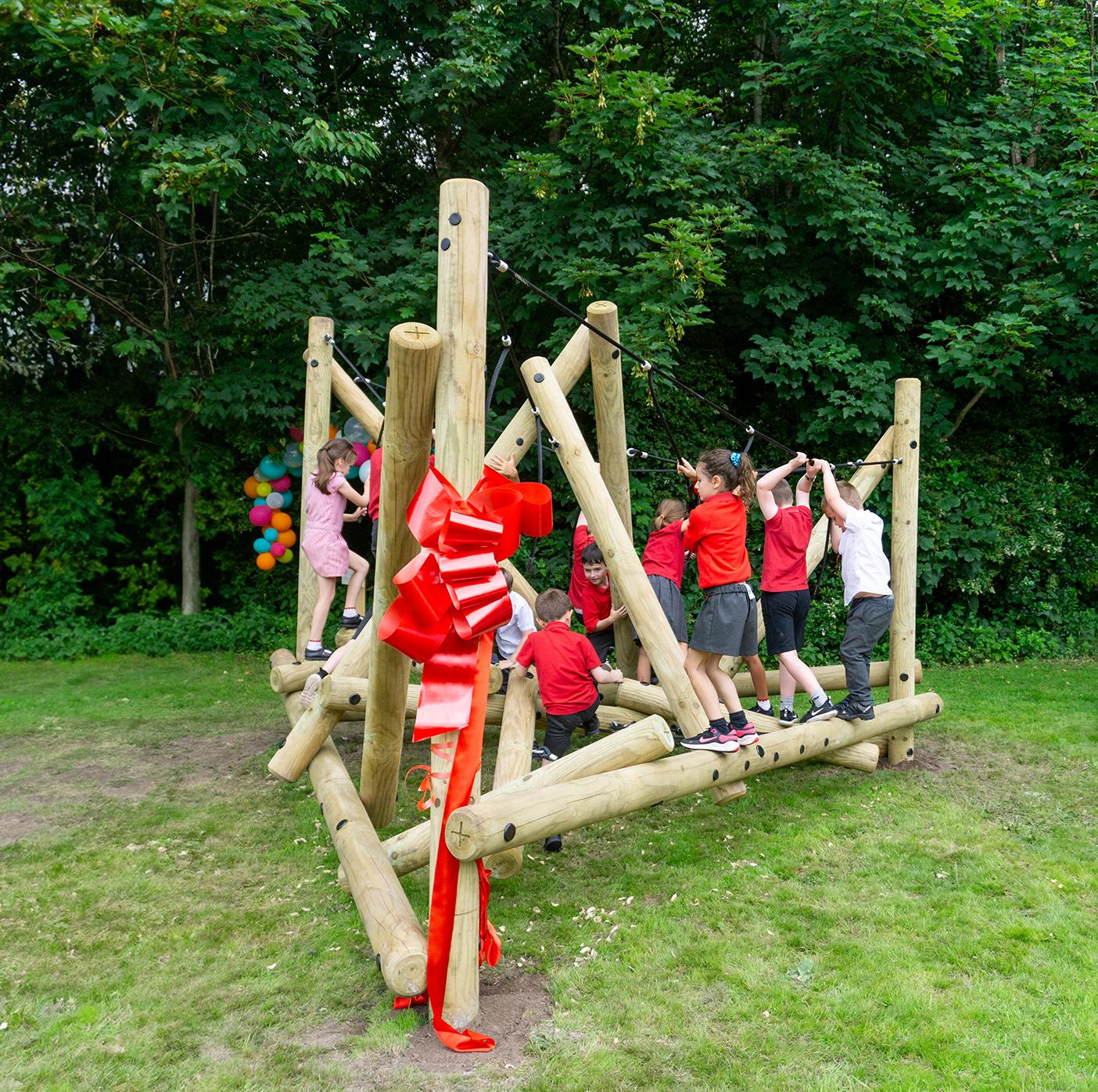 A group of EYFS children on the Latrigg Mountain Climber.