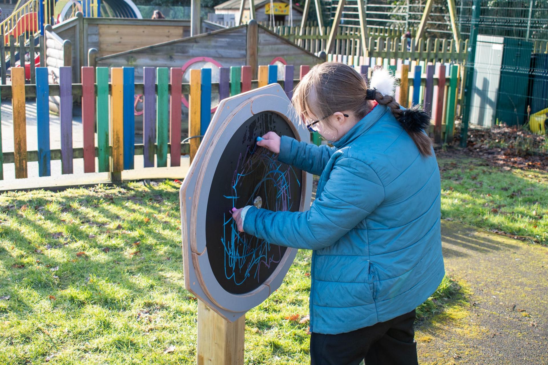 Girl Using the Drawing Sensory Spinner