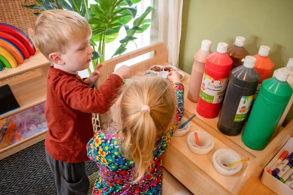 Children using Millhouse Continuous Provision Trolley