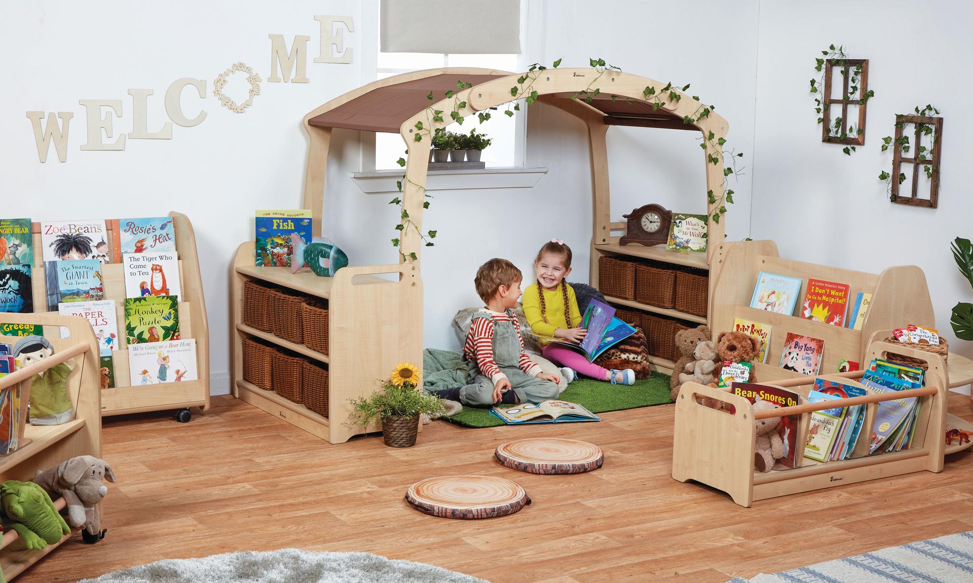 A young boy and girl are reading books inside the Cosy Reading Zone - Taupe roof without baskets.