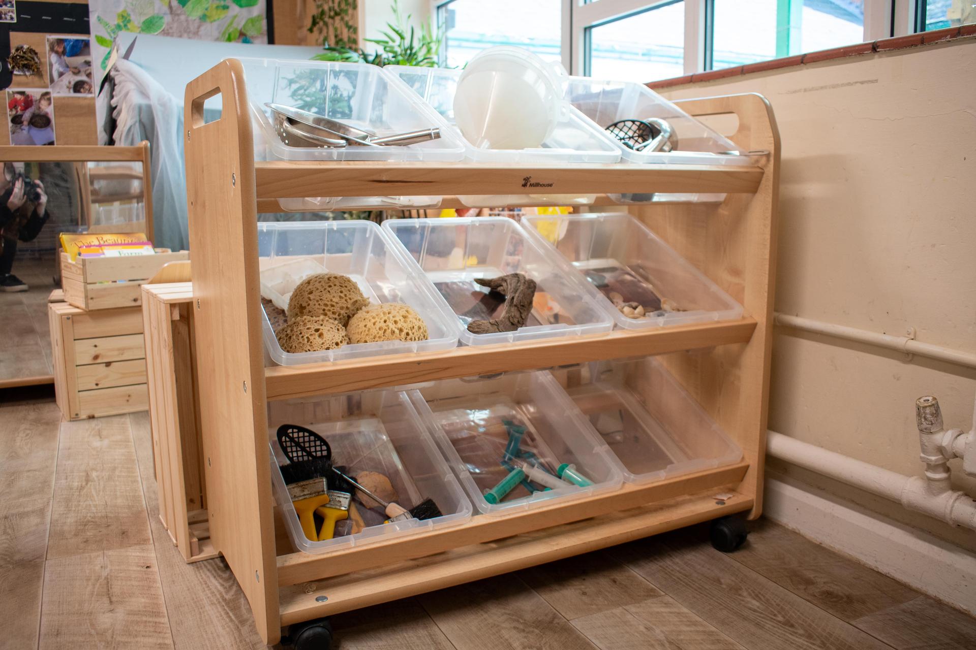 Millhouse Tilt Tote Storage filled with messy play products