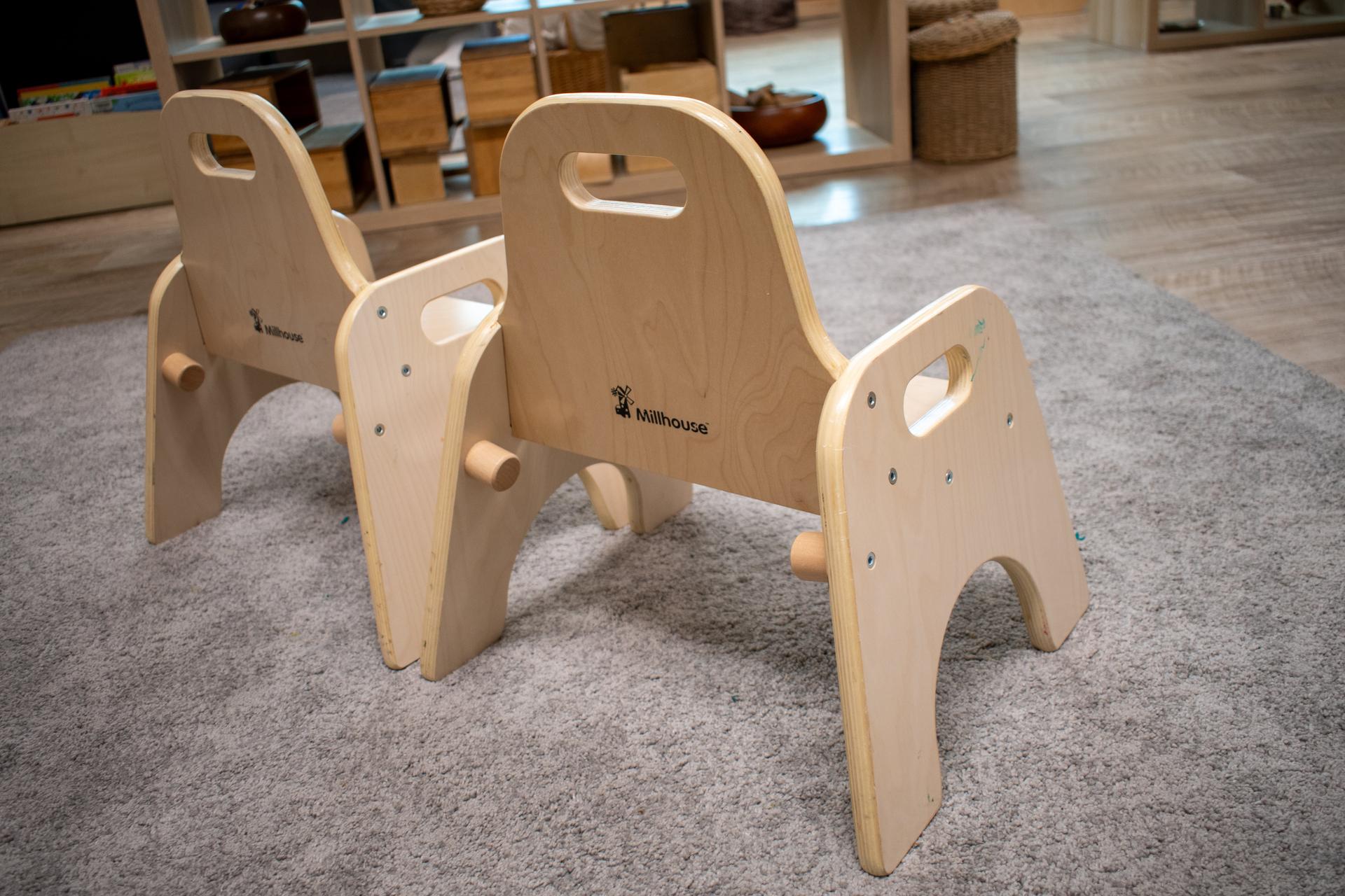 the back of two sturdy chairs in an eyfs setting