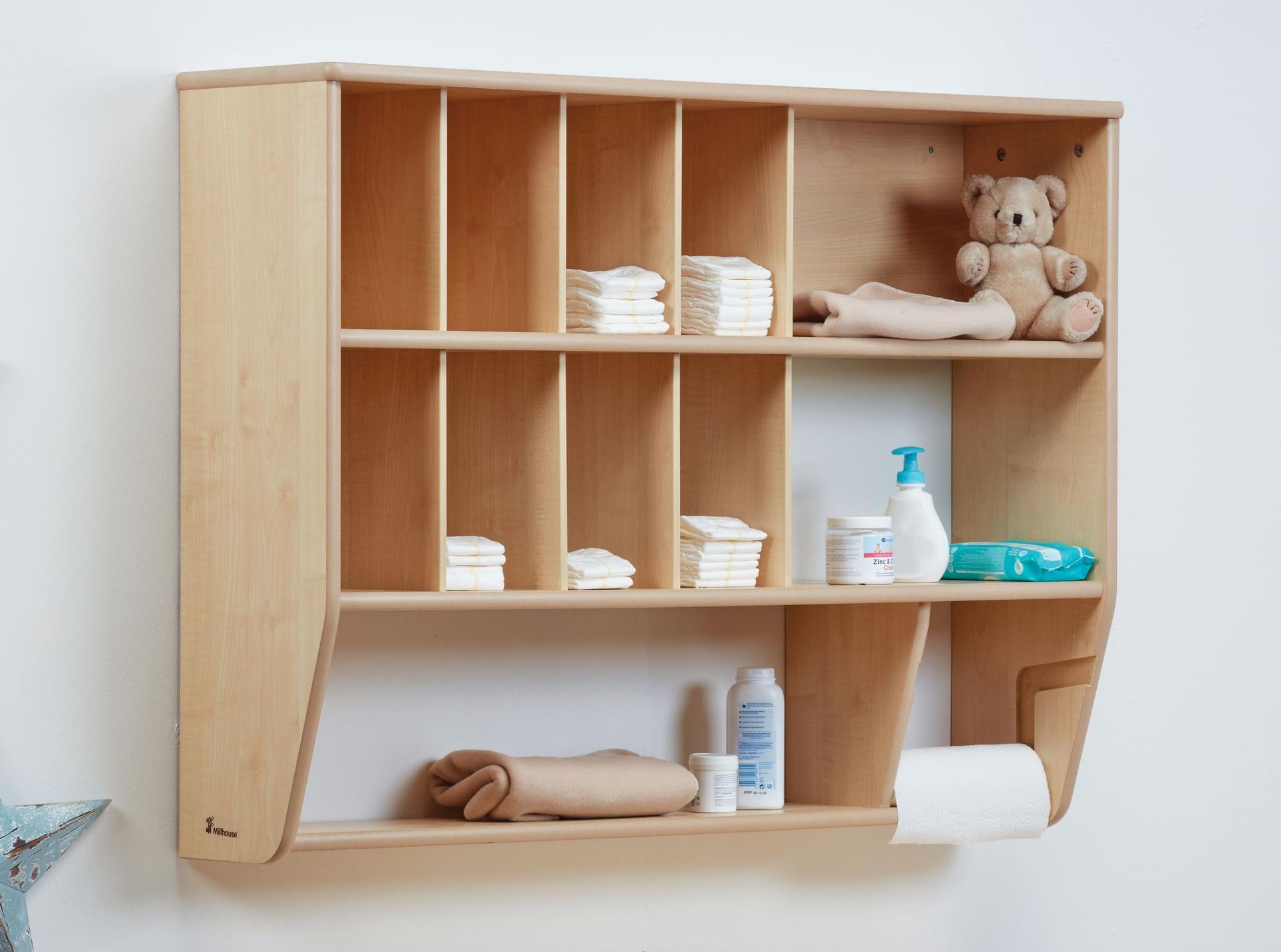 The Baby Changing Wall Storage Unit has various items stored on it.