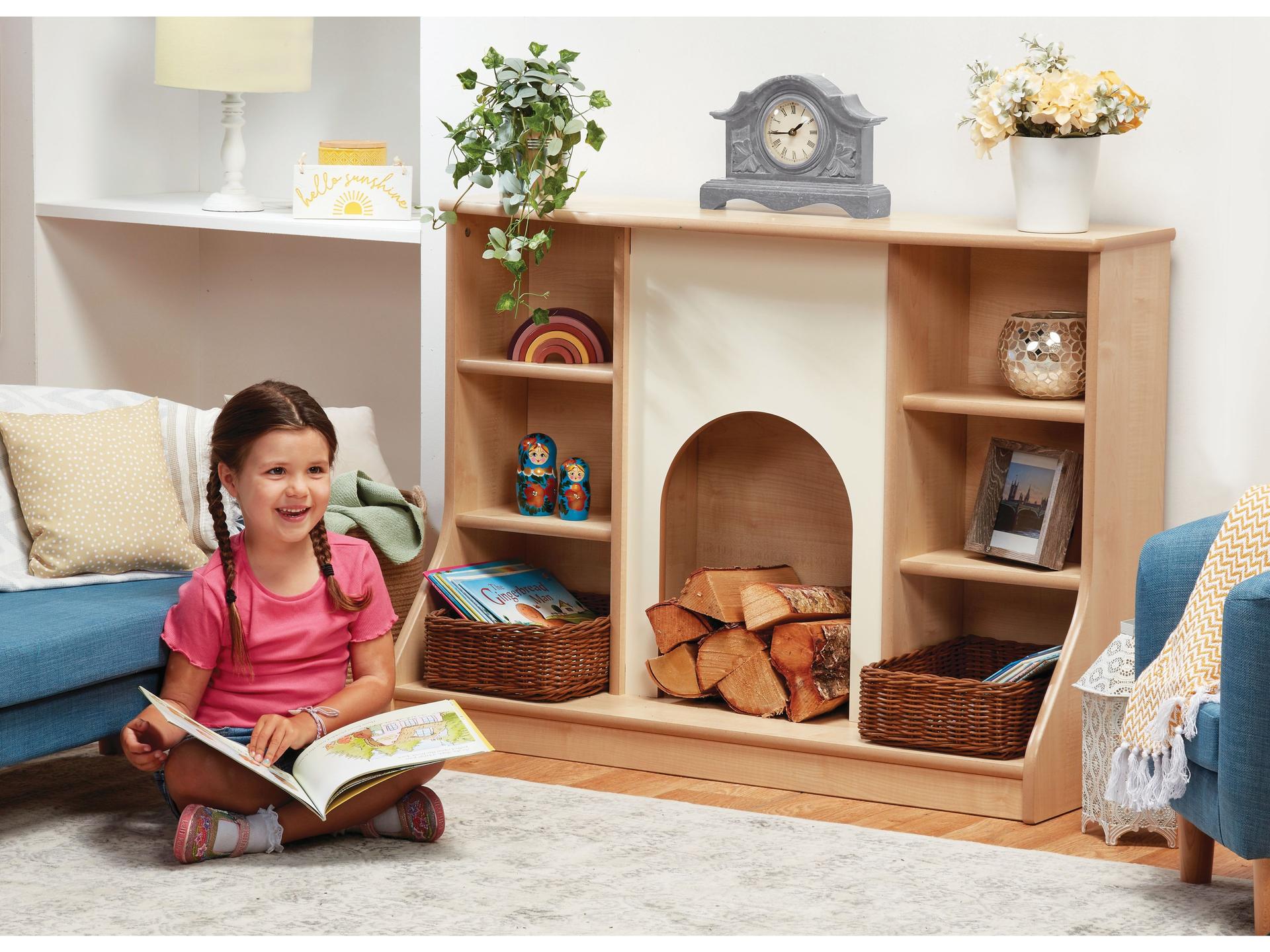 millhouse fireplace in a reading area of a nursery with a child reading a book