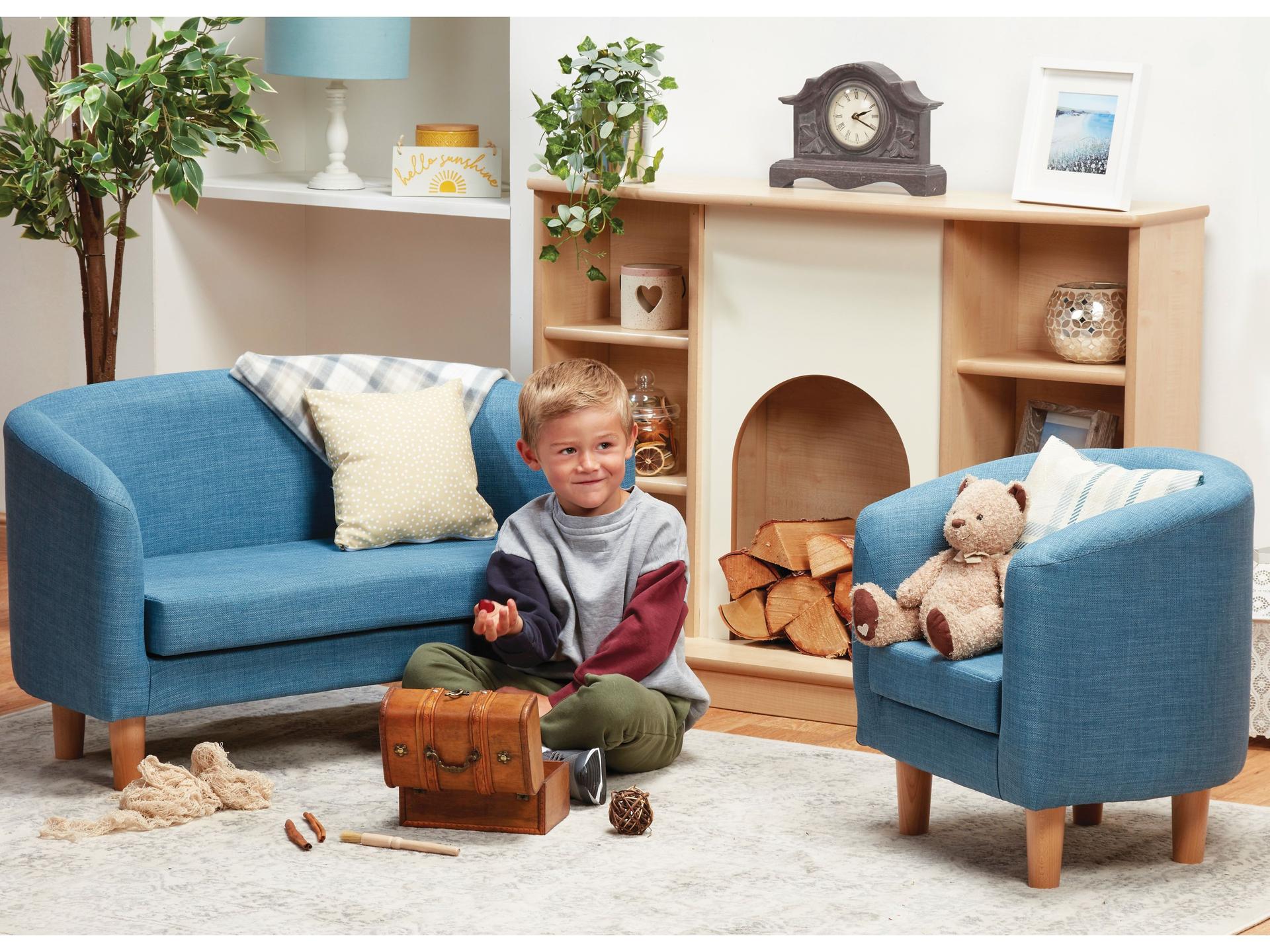 millhouse sofa and chair in blue in a cosy eyfs role play area