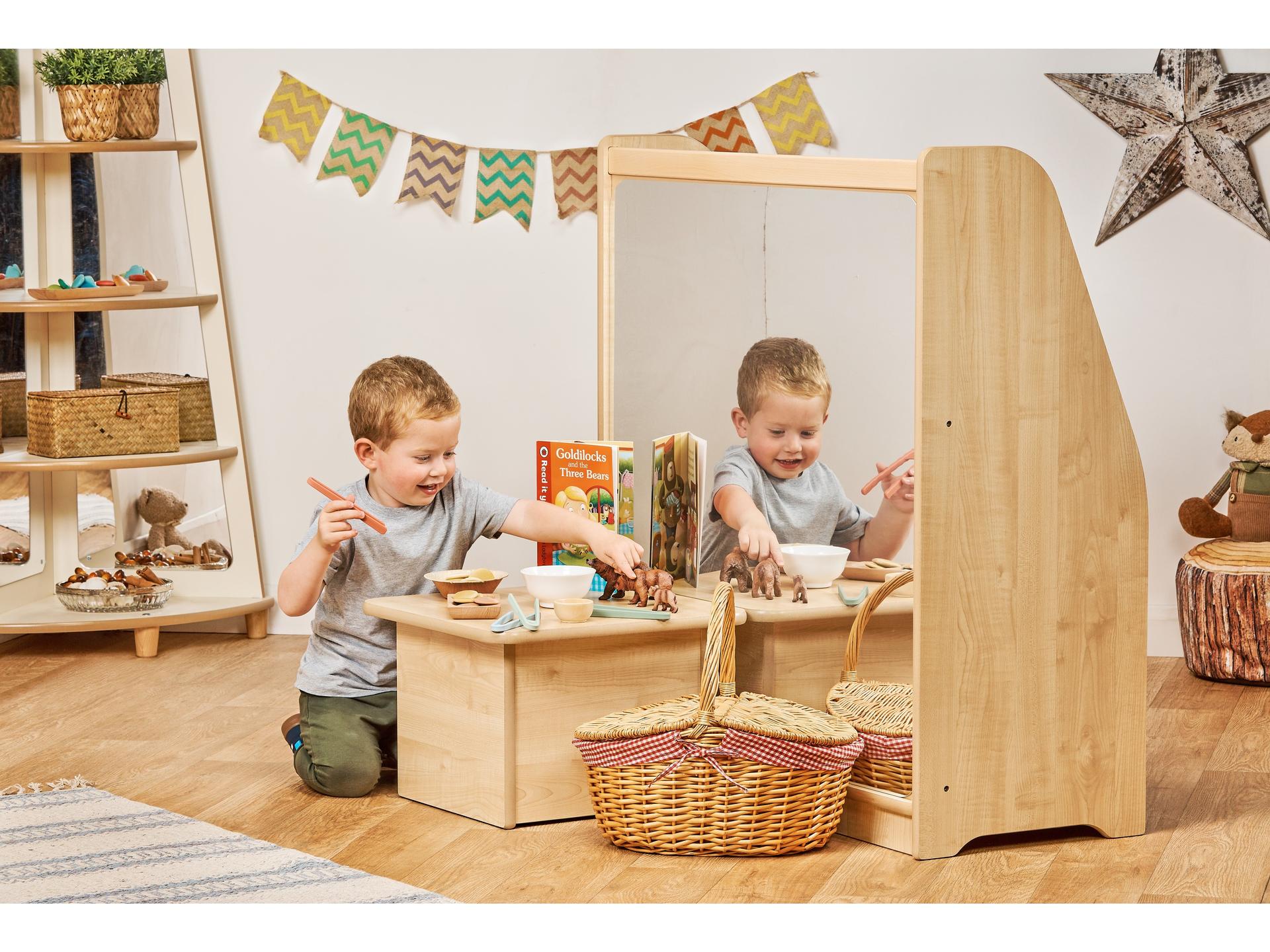 millhouse small table with small world items on top and child playing