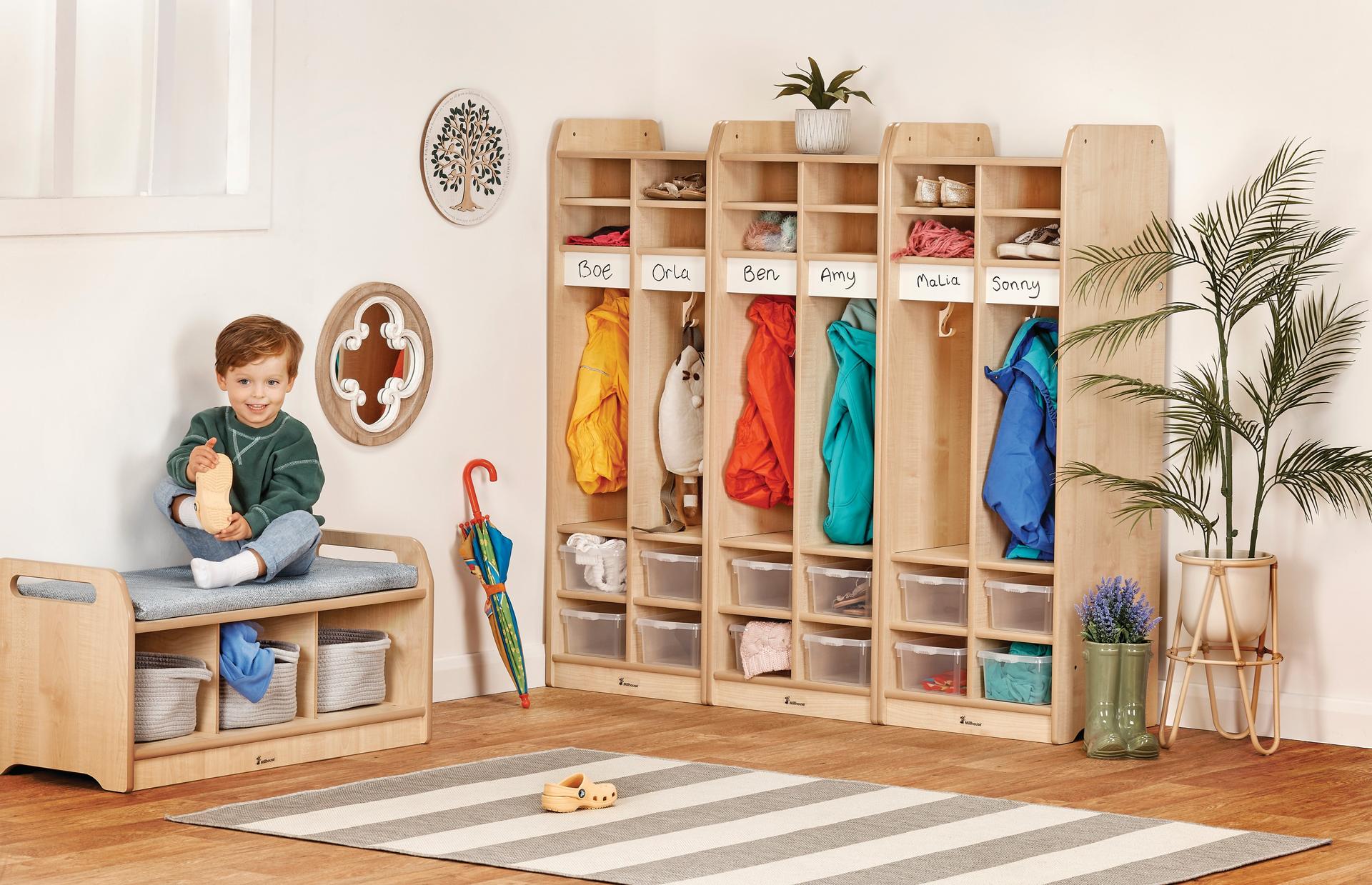 Six clear tubs, hooks, and panels for children to personalize. Low and easy to reach.