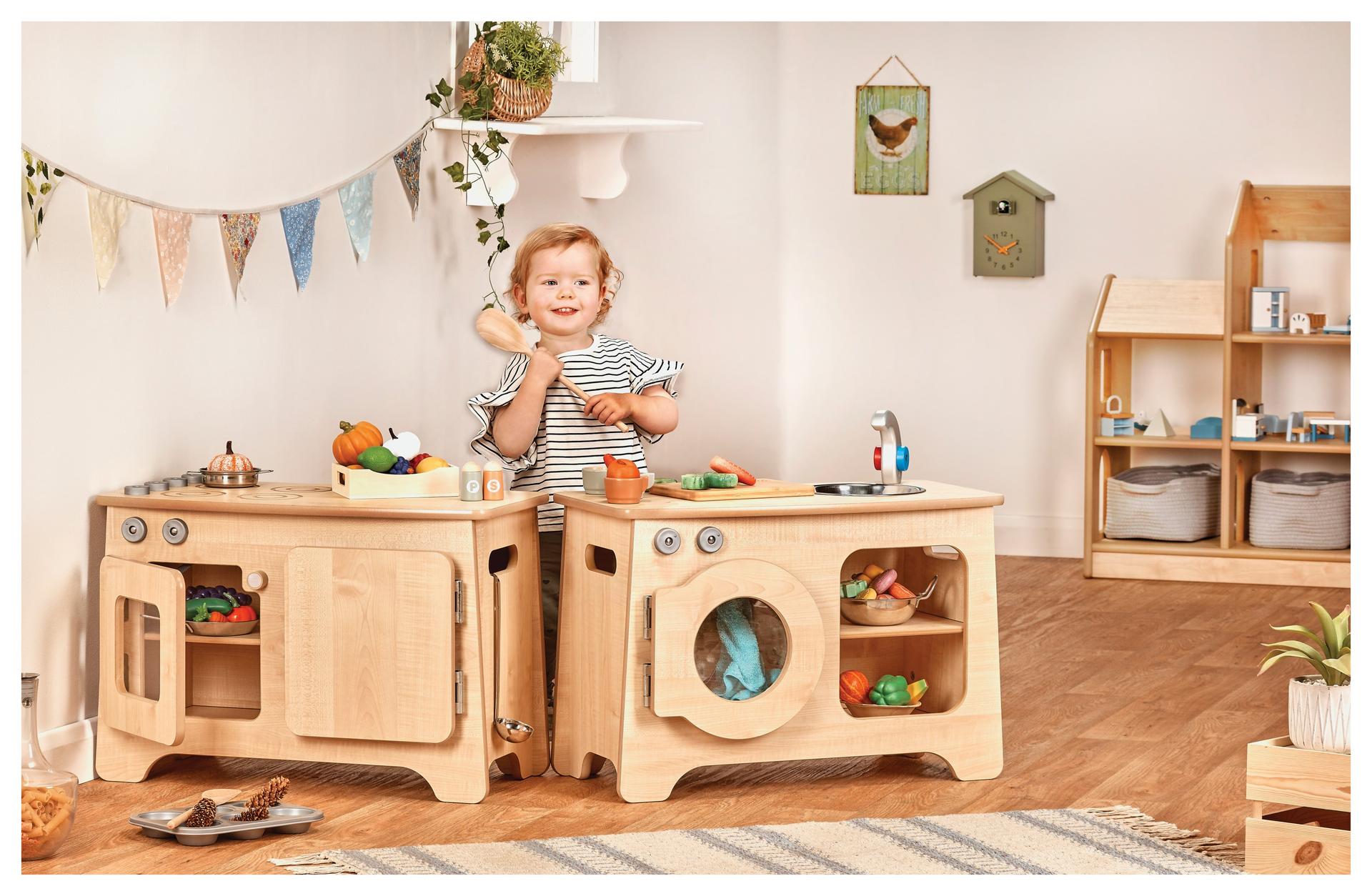 Complete play kitchen with sink, oven, and fridge. Child-height, safe, interactive.