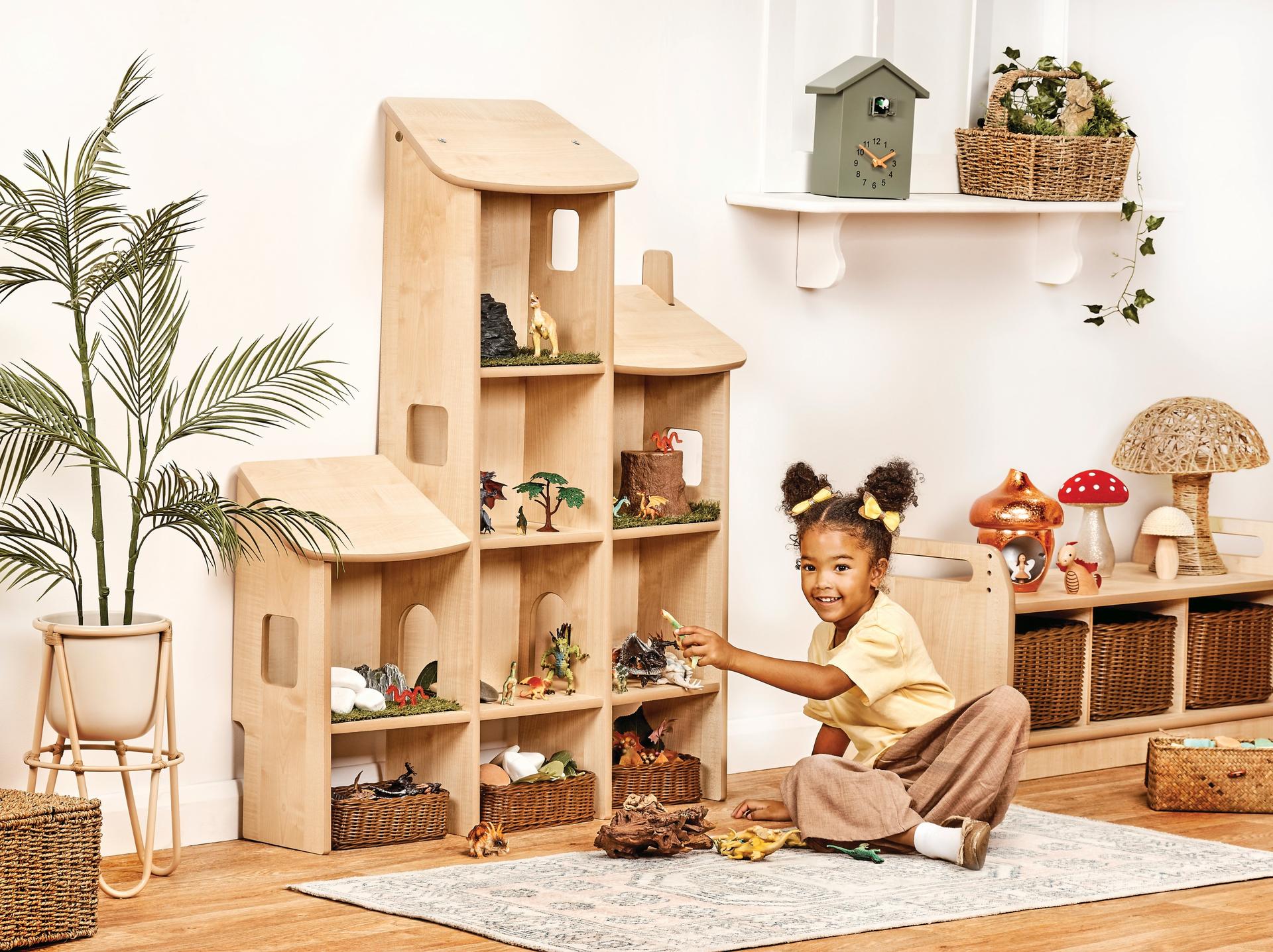 Multi-level wooden play structure. Open platforms. For small-world play and group activities.