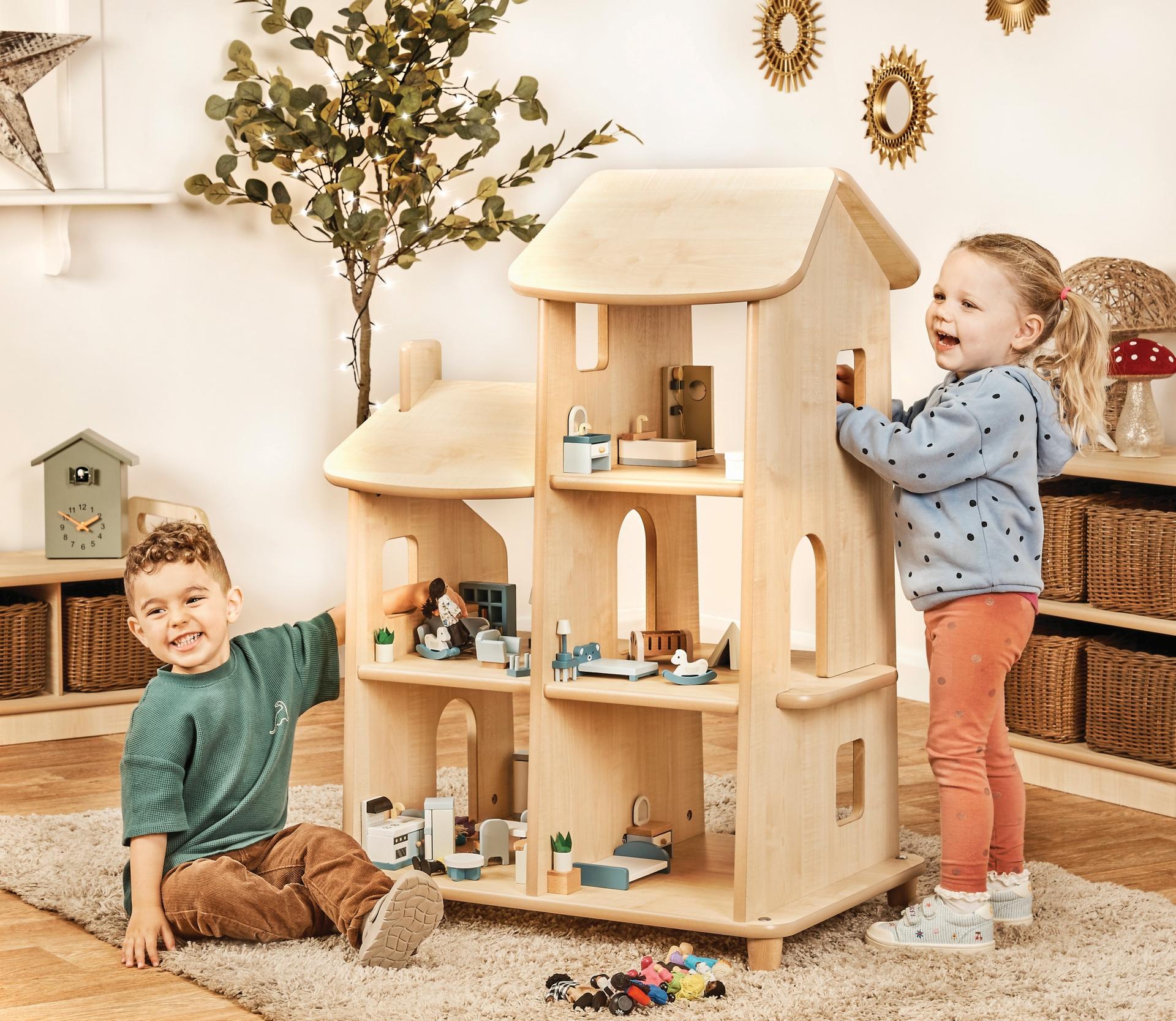 Open wooden town house in natural colors. Safe, sturdy, and good for group play.