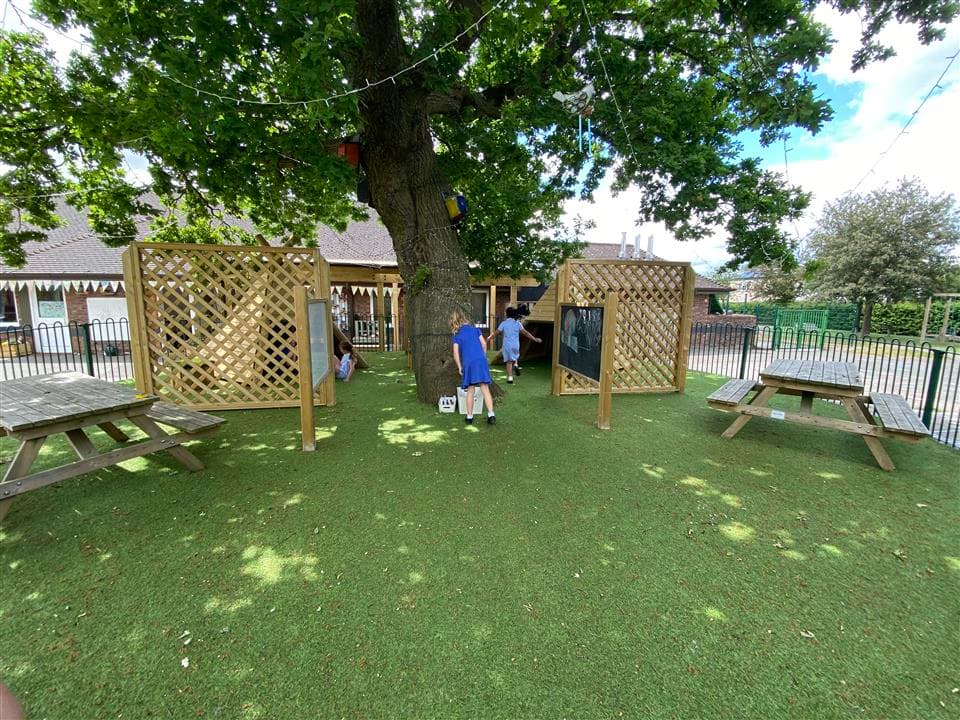 children playing on artificial grass