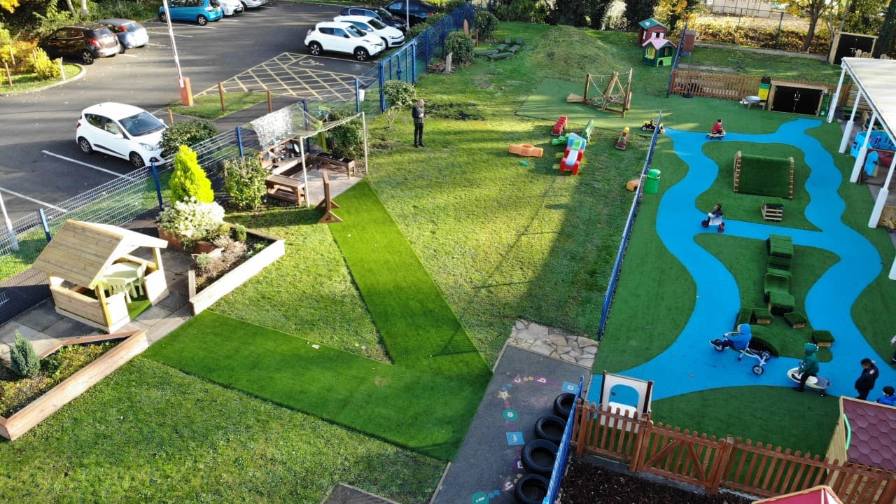 a birdseye view of the green artificial grass playturf