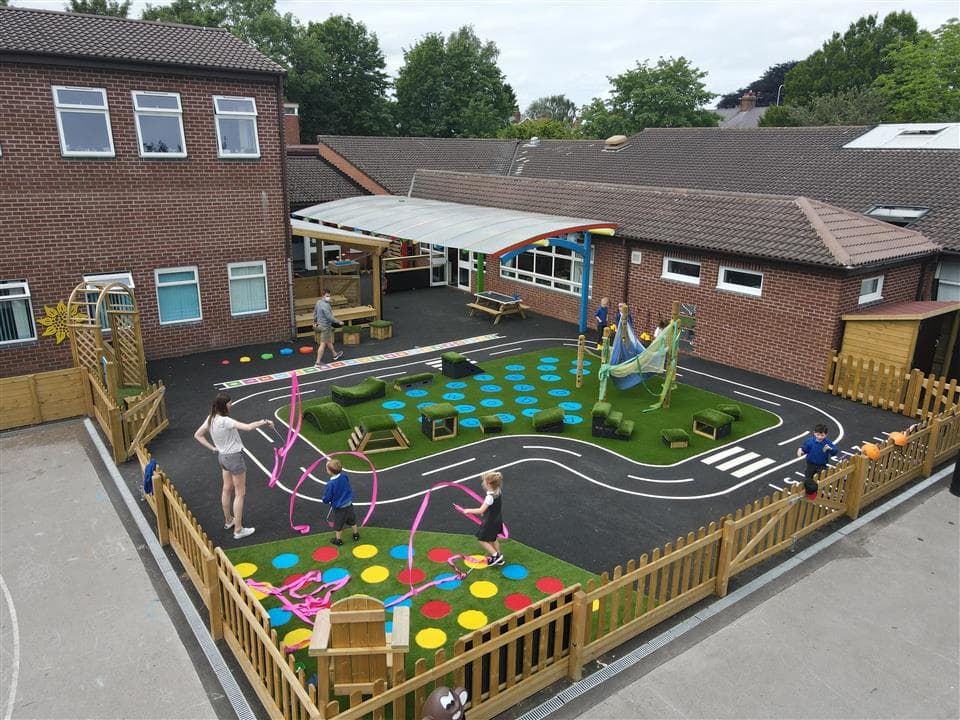 a whole view of playground with raodway