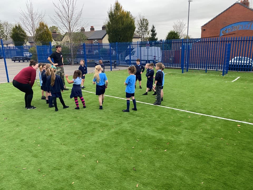the artificial grass sports surfacing used within a muga
