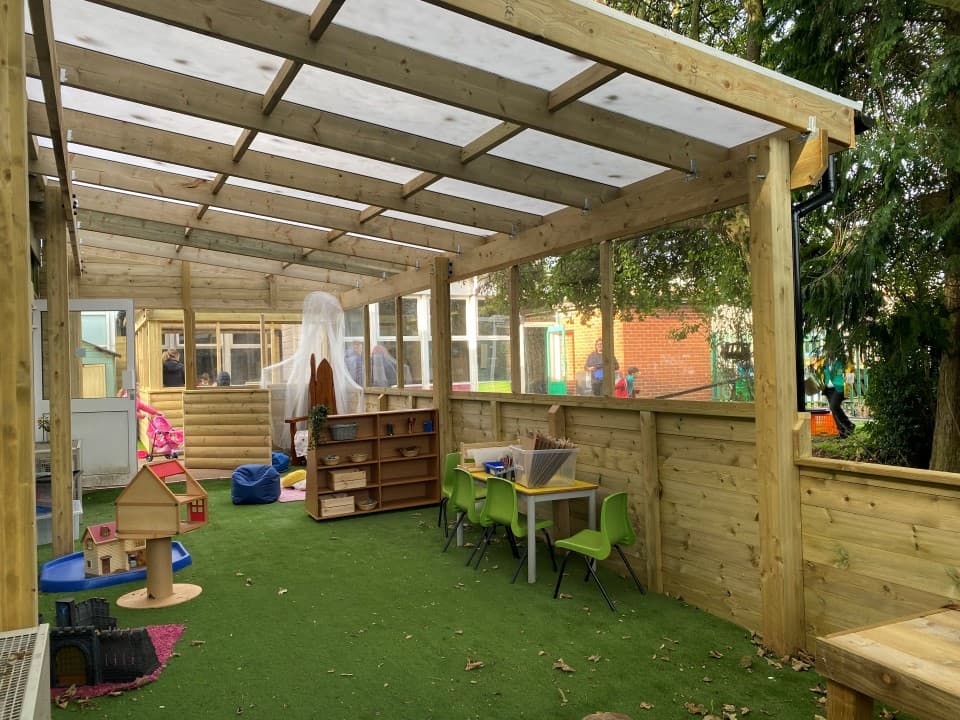 canopy with cladded sides and glazing