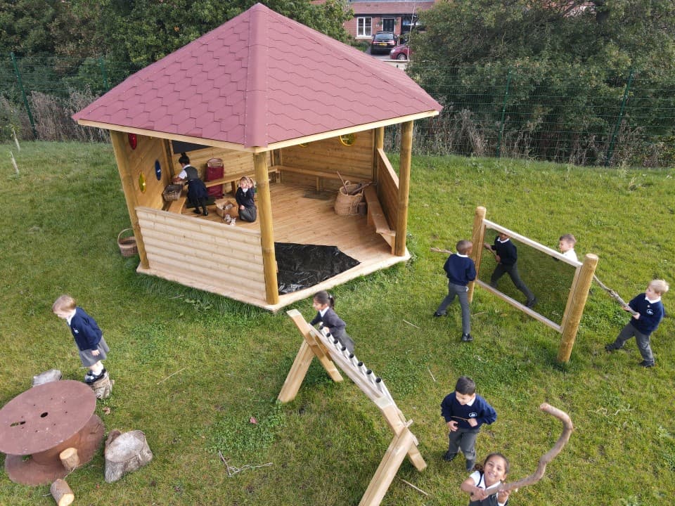 hexagonal gazebo with roof, cladded sides and ramp