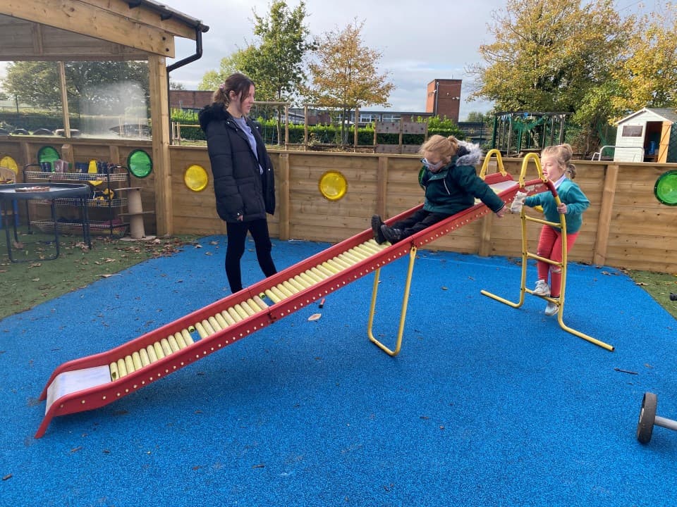 blue wetpour surfacing underneath a slide