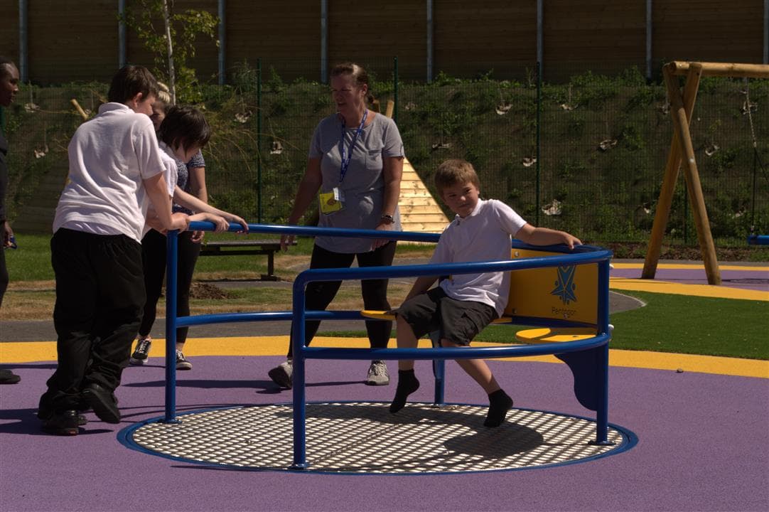 children playing on our roundabout