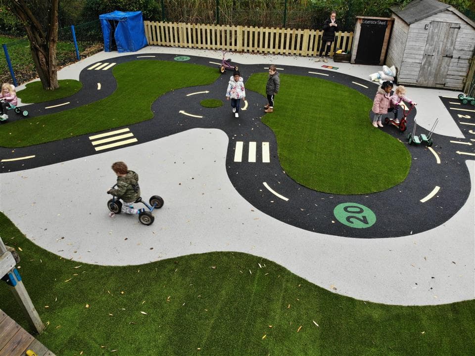 A birds eye view of children on the roadway. 