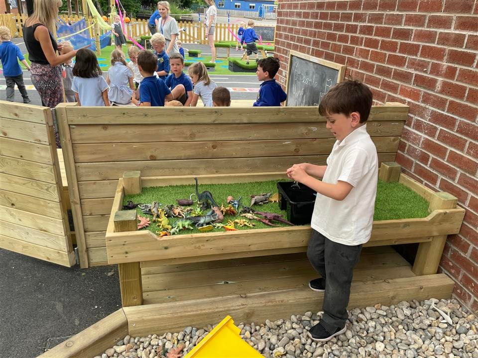 a child playing on our construction table