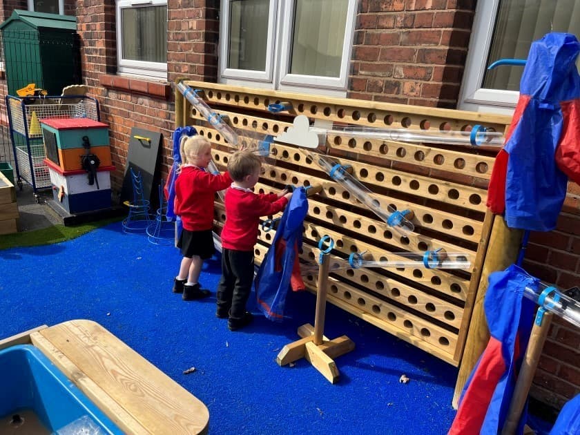Children can work together with their peers to direct the water