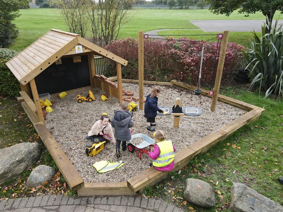 children playing in their messy play area