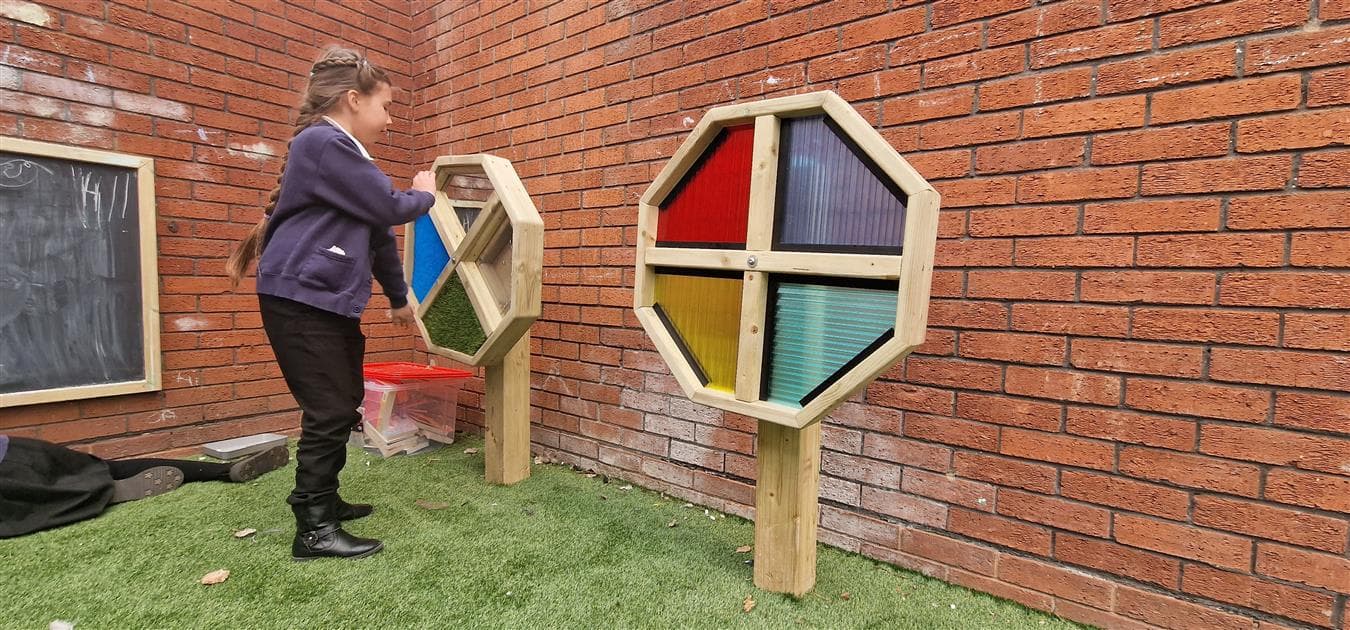 A pair of sensory spinners in a ks2 playground