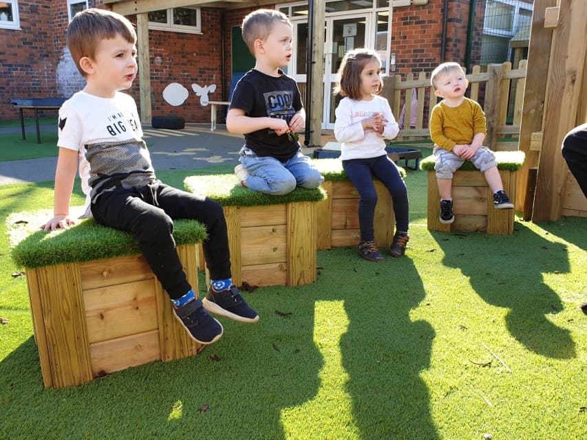 Artificial Grass Topped Seats For Nursery
