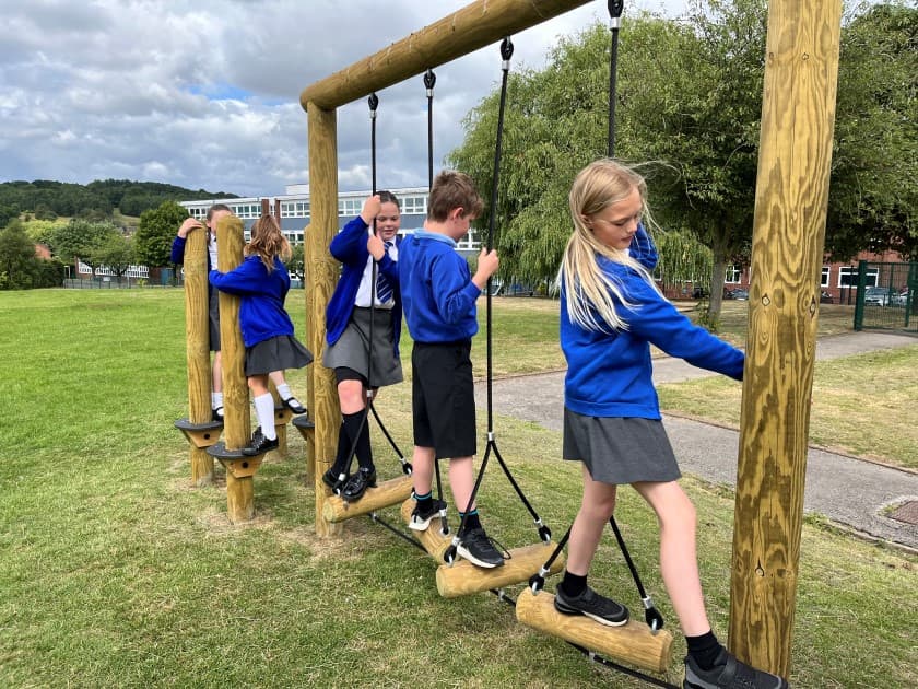 Horizontal swinging log crossing for trim trails 