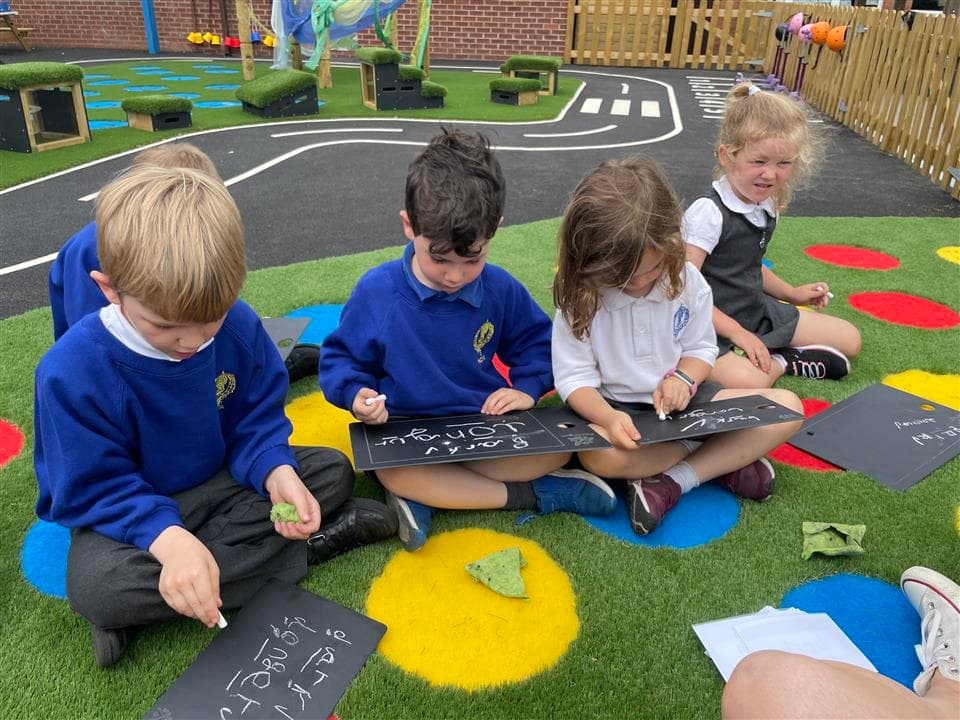 children playing with our scribble oards