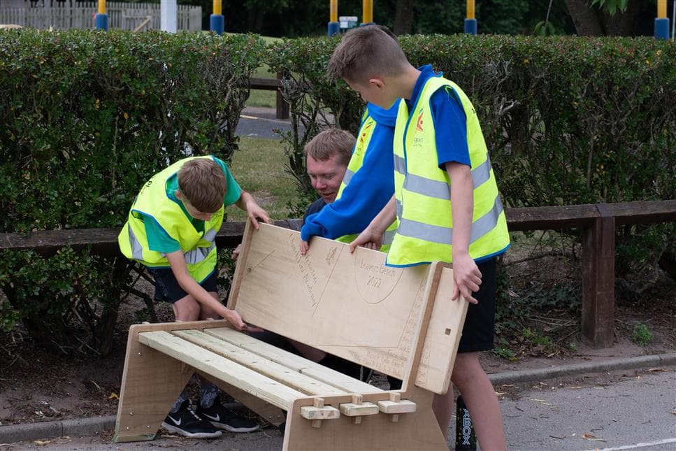 3 boys constructing their leavers bench
