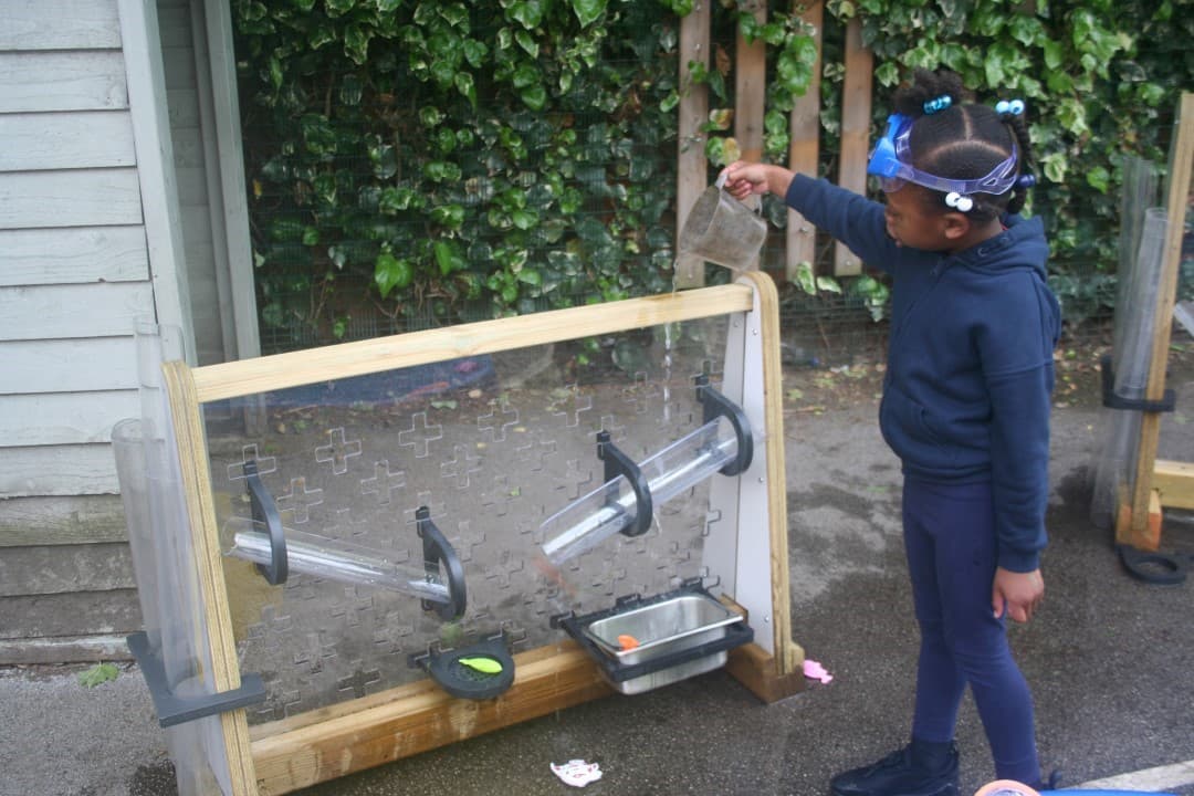 Children will have no trouble reaching the top of the channels to direct the water